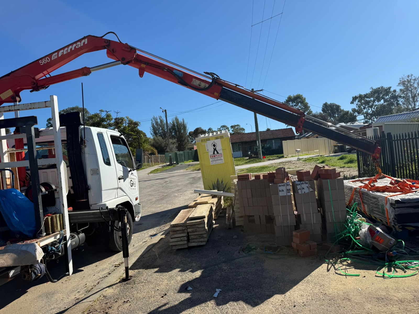 Palletised load handled and secured for transport, Perth